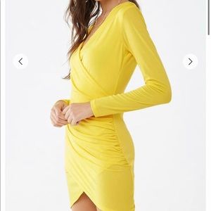 Surplice Tulip hem dress. Brand New